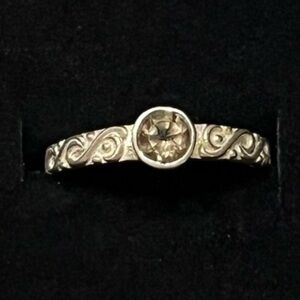 Sterling silver ring with light brown stone, size 8.5. Unique swirl band